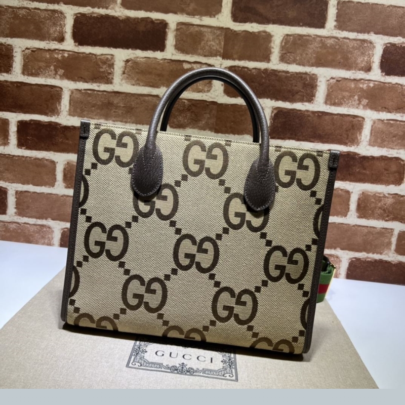 G*u*i shopping bags